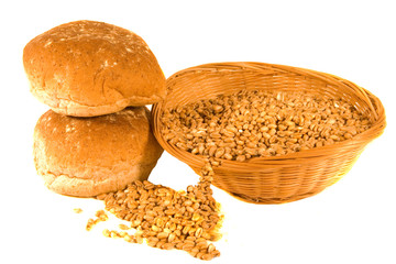 Bread Rolls and Wheat Grains spilling from Whicker Basket