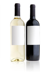 red wine and white wine bottles isolated at white background