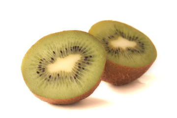 One green fruit on a white background
