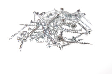 Closeup of screws over white background