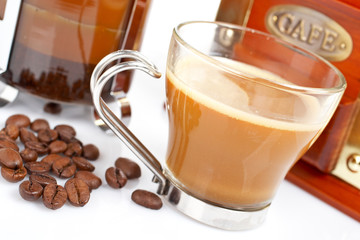 Coffee pot and beans, reflected on white background