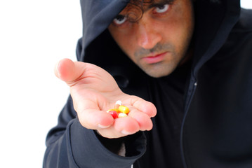 Man offering drugs or medicines on white .