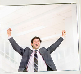 Happy businessman celebrating success
