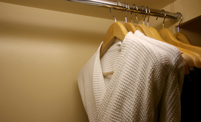 bathrobes with wooden hangers