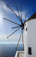Windmill on the island of Santorini, overlooking the Aegean Sea