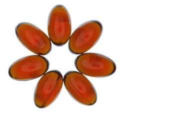 Flower made from red capsules isolated over white background