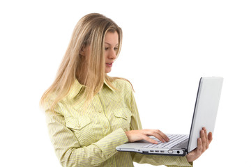 Naklejka premium beautiful casual woman with her modern laptop on white