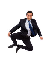 energic businessman jumping high on white background
