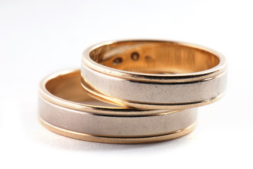 Wedding rings on white background
