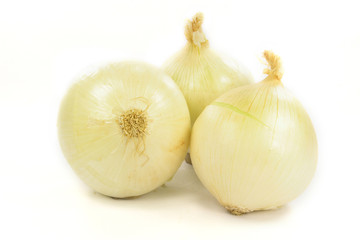 Bulbs of white sweet onion over white background.