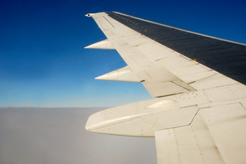 Fototapeta na wymiar Looking outside from a plane