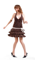 Young girl in summer clothes isolated at the white background