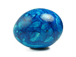 Blue easter egg on white background