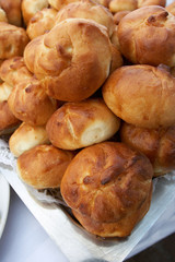 Rolls from fancy pastry combined by mountain on a tray