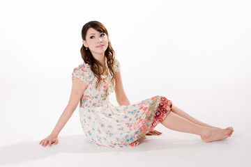 young woman sitting on the floor
