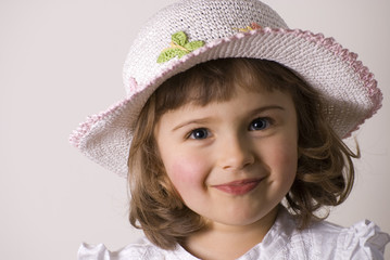 Happy girl in summer hat