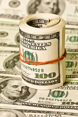 Fototapeta premium money series: hudreds of green dollar roll