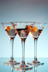 Martini glass with olive inside