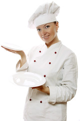 Attractive cook woman with dishes