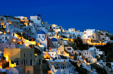 The village of Oia at dusk, on the island of Santorini, Greece - 6343408