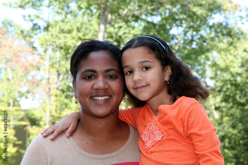 Wall mural A mixed race mother and daughter