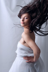 portrait of a beautiful woman with flying hair