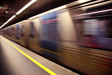 An abstract subway train blured in motion