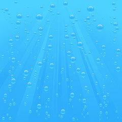 air bubbles floating in blue clear water