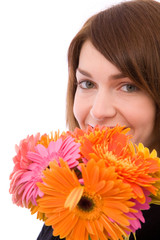 young and happy woman with flowers on white background