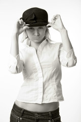 young beautiful woman in white shirt and black hat