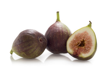Three figs isolated on white