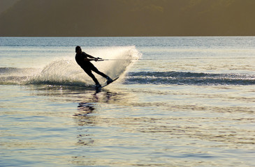 sunset Waterskier sprays water Pittwater  Australia