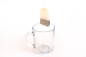 Cup of  tea with with teabags on white background
