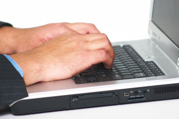 Man typing on the laytop