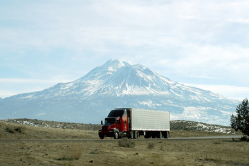 Semi truck going fast on interstate highway 