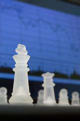 Chess and stock market diagram. Business concept.