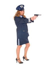 Attractive female police officer pointing gun. 