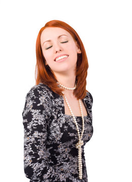smiling woman, her eyes shut, looks happy and loved