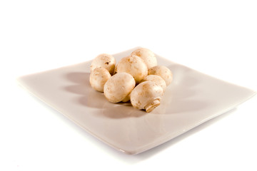 mushrooms on square plate