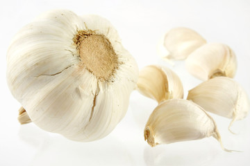 Garlic cloves over white