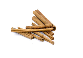 cinnamon sticks isolated on white