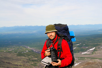 Kamchatka.Turist-photographer 