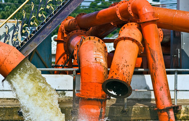 Industrial orange tubes in Bangkok.