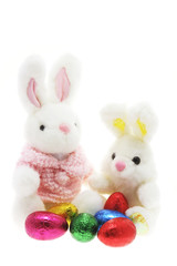 Bunnies and Easter Eggs on White Background