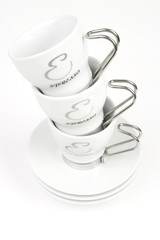 three white cup on white
