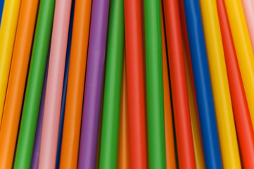 Lots of drinking straws of various colors