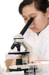 Girl with microscope.