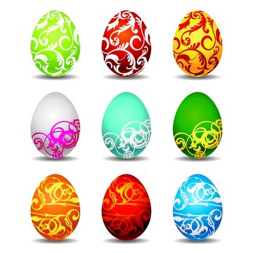 nine color easter eggs on white background