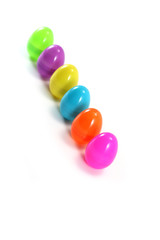 Line of pastel Easter Eggs on white