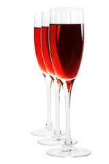 Three glasses with red wine on a white background